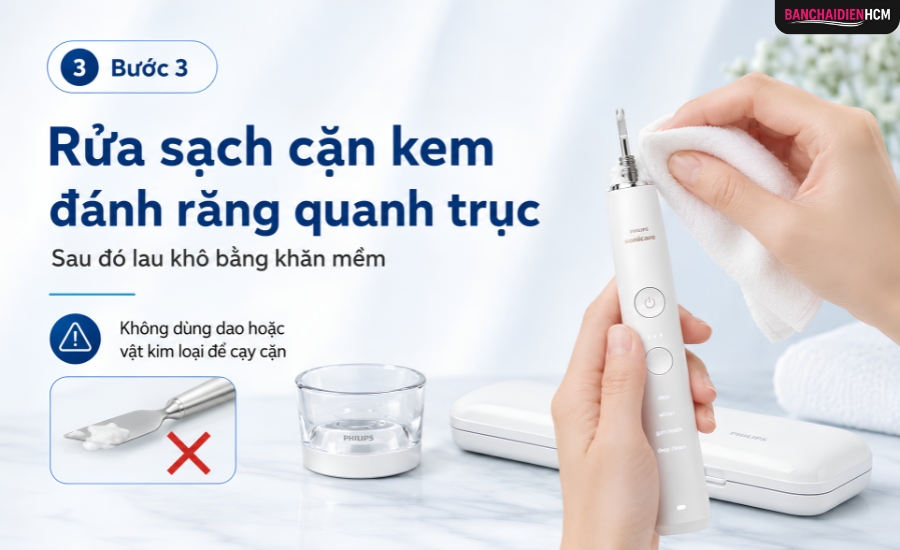 Rửa sạch cặn kem đánh răng quanh trục, sau đó lau khô bằng khăn mềm. Không dùng dao hoặc vật kim loại để cạy cặn